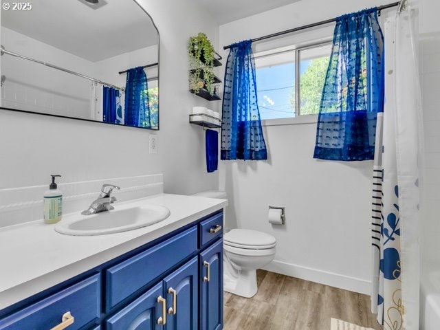 3185 14th Ave, Albany, OR 97322 - full bathroom with vanity, wood finished floors, and curtained shower