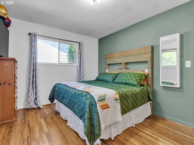 3185 14th Ave, Albany, OR 97322 - bedroom with wood finished floors