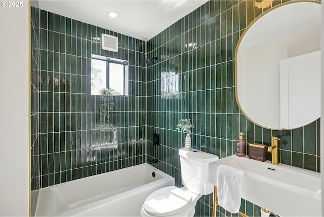 2615 N Gammans Pl, Portland, OR 97217 - bathroom with tile walls and washtub / shower combination