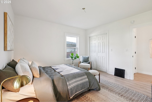 2615 N Gammans Pl, Portland, OR 97217 - bedroom with light wood finished floors and a closet