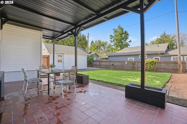 2615 N Gammans Pl, Portland, OR 97217 - fenced backyard with a patio and outdoor dining area