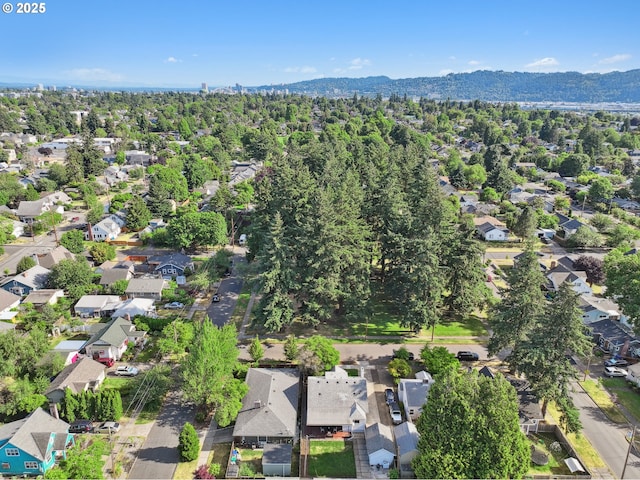 2615 N Gammans Pl, Portland, OR 97217 - aerial overview of property's location featuring nearby suburban area and a mountain backdrop