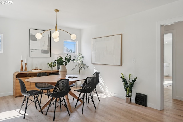 2615 N Gammans Pl, Portland, OR 97217 - dining room featuring light wood finished floors and baseboards