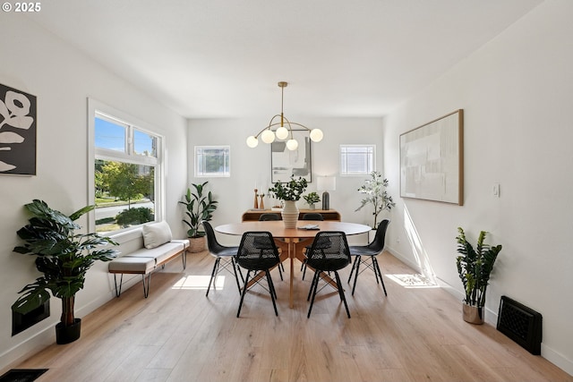 2615 N Gammans Pl, Portland, OR 97217 - dining room with healthy amount of natural light and light wood finished floors