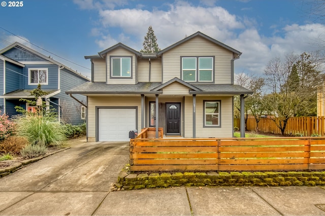 view of front of house featuring a fenced front yard, an attached garage, roof with shingles, and driveway