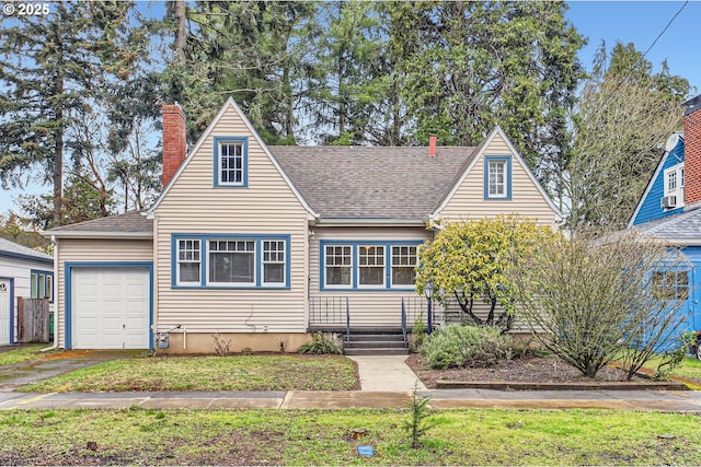 view of front of home with an attached garage, a front lawn, roof with shingles, and a chimney