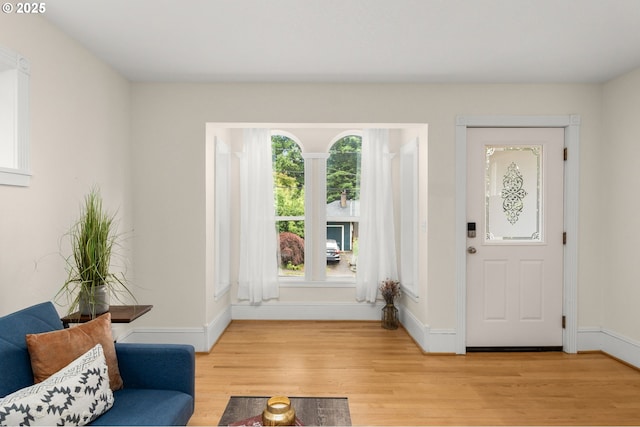4113 SE Rural St, Portland, OR 97202 - foyer with light wood-style flooring and baseboards