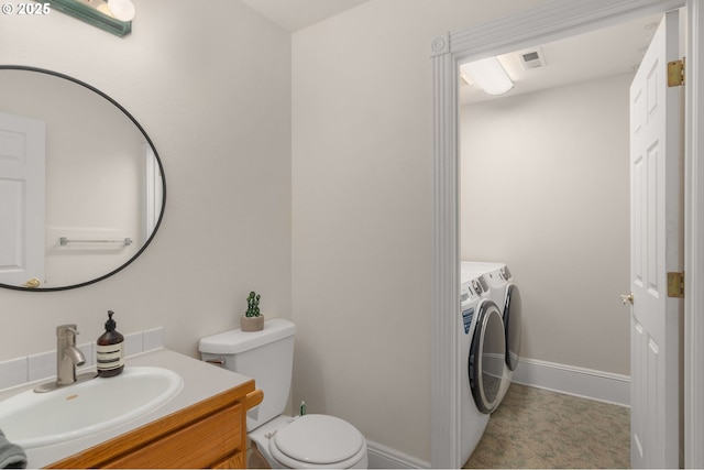 4113 SE Rural St, Portland, OR 97202 - bathroom featuring independent washer and dryer and vanity