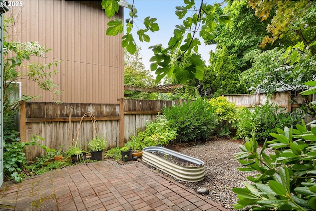 4113 SE Rural St, Portland, OR 97202 - fenced backyard with a patio area