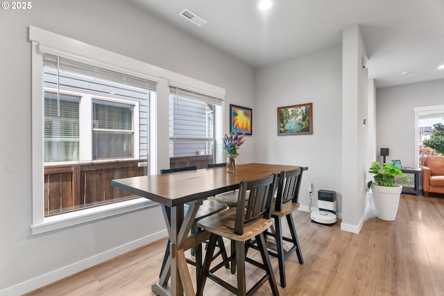 11465 SE Pleasant Valley Pkwy, Happy Valley, OR 97086 - dining area with baseboards, light wood finished floors, and recessed lighting