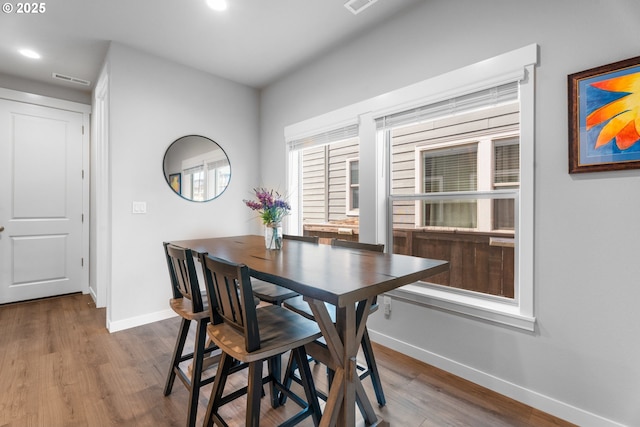 11465 SE Pleasant Valley Pkwy, Happy Valley, OR 97086 - dining space featuring baseboards, wood finished floors, and recessed lighting