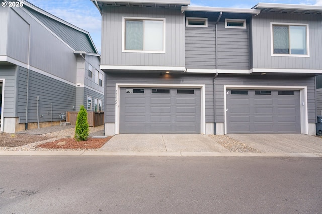 11465 SE Pleasant Valley Pkwy, Happy Valley, OR 97086 - view of front facade with an attached garage and concrete driveway