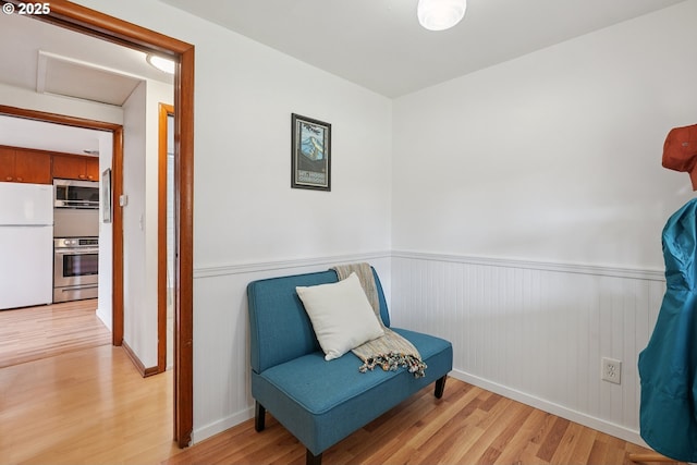 10544 SE Home Ave, Milwaukie, OR 97222 - sitting room featuring light wood finished floors and wainscoting
