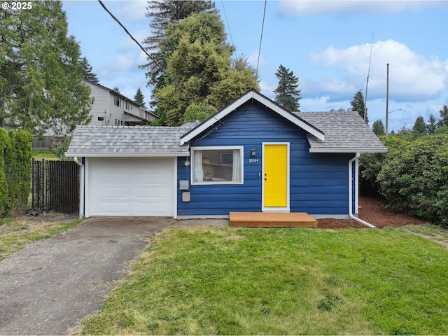 10544 SE Home Ave, Milwaukie, OR 97222 - view of front facade with asphalt driveway, a garage, and roof with shingles
