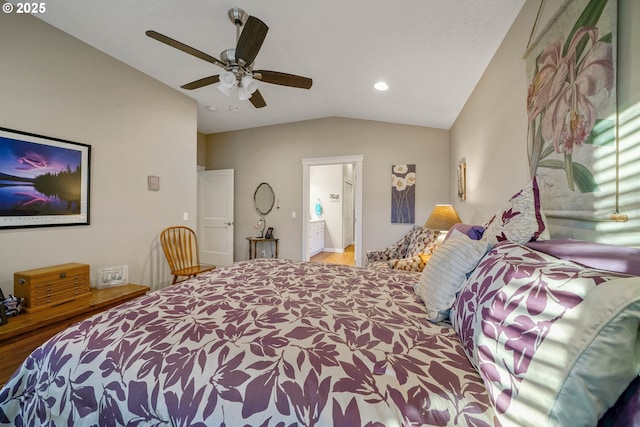 bedroom featuring hardwood / wood-style flooring, lofted ceiling, and ceiling fan