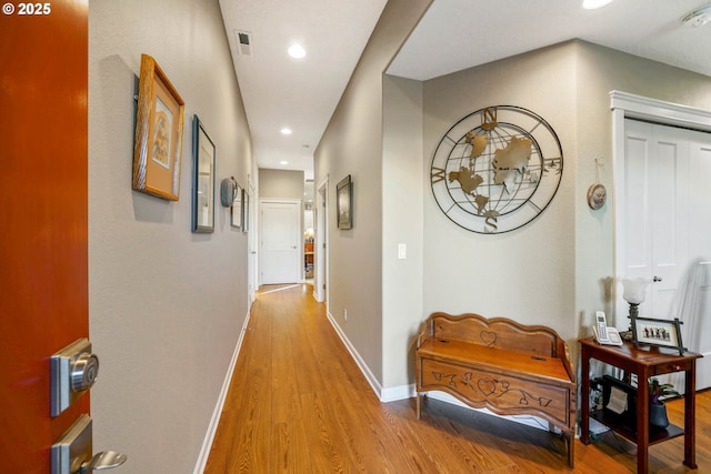 hallway featuring light hardwood / wood-style floors