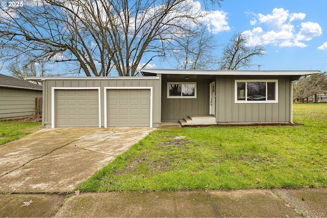 single story home featuring a garage and a front lawn