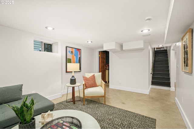 2942 NE 34th Ave, Portland, OR 97212 - living area with baseboards, concrete flooring, stairs, and recessed lighting