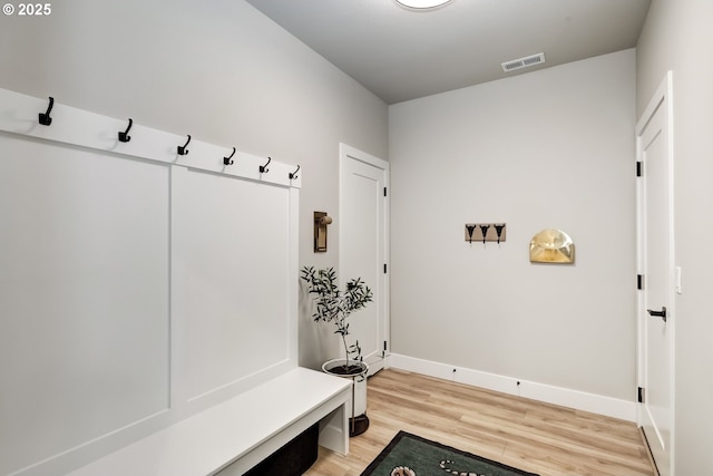 mudroom featuring wood-type flooring