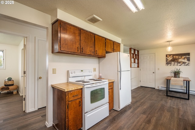 kitchen with dark wood finished floors, visible vents, white appliances, a baseboard heating unit, and a textured ceiling