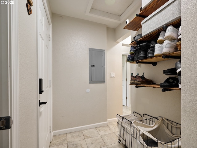 interior space featuring electric panel and light tile patterned floors