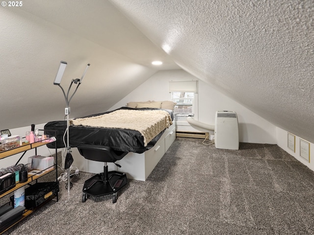 carpeted bedroom with a baseboard heating unit, a textured ceiling, and lofted ceiling