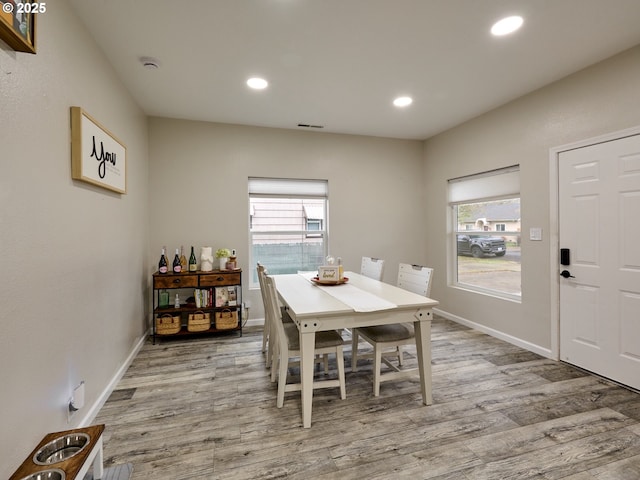 dining area with light wood-type flooring