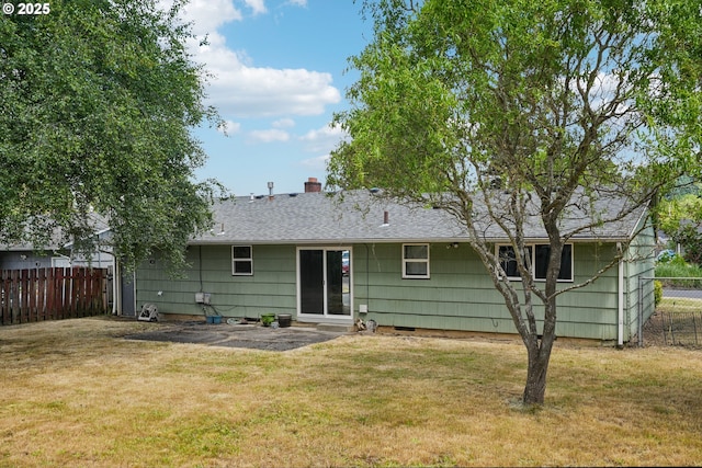 3259 SE 176th Pl, Portland, OR 97236 - back of house featuring a patio, a chimney, and a shingled roof