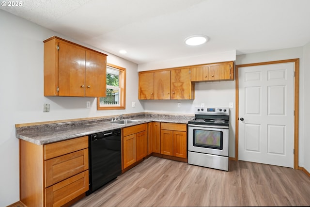 3259 SE 176th Pl, Portland, OR 97236 - kitchen featuring black dishwasher, stainless steel electric range oven, light wood-style floors, brown cabinetry, and recessed lighting