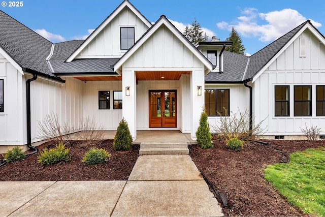 view of front of home featuring roof with shingles, crawl space, french doors, a porch, and board and batten siding