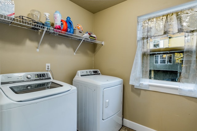 laundry room with washer and clothes dryer