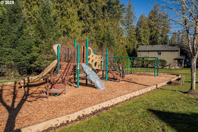 view of playground with a lawn