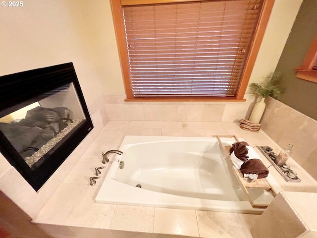 bathroom with tiled bath