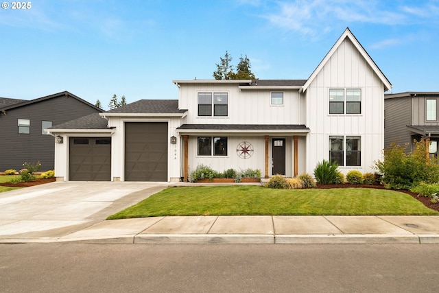 1046 SE Olive Way, Estacada, OR 97023 - view of front of house featuring an attached garage, a front yard, roof with shingles, concrete driveway, and board and batten siding