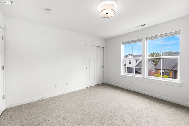 1046 SE Olive Way, Estacada, OR 97023 - unfurnished room featuring baseboards, light colored carpet, and a smoke detector