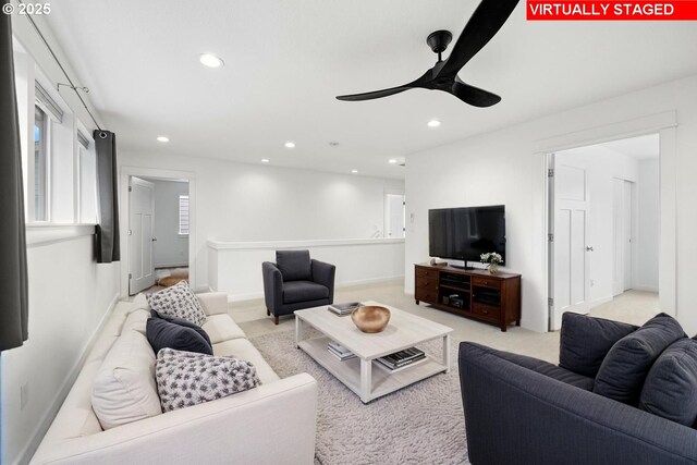1046 SE Olive Way, Estacada, OR 97023 - living room featuring a ceiling fan, recessed lighting, light colored carpet, and baseboards