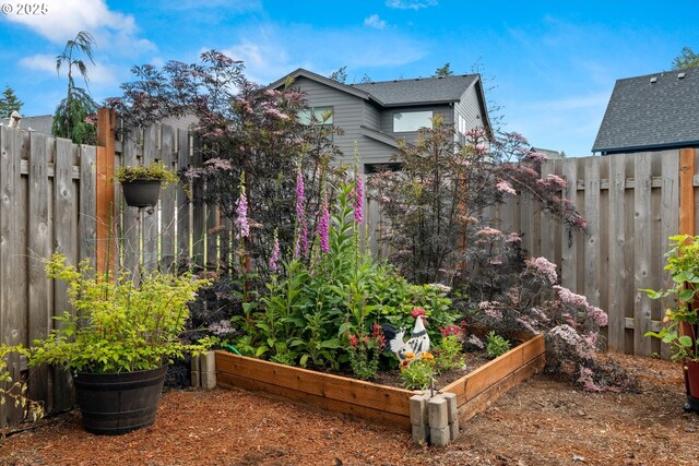 1046 SE Olive Way, Estacada, OR 97023 - fenced backyard with a vegetable garden