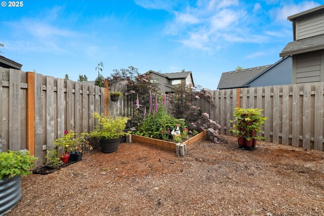 1046 SE Olive Way, Estacada, OR 97023 - fenced backyard with a garden