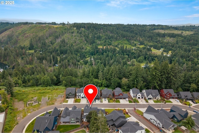 1046 SE Olive Way, Estacada, OR 97023 - aerial view of property's location featuring a heavily wooded area and nearby suburban area