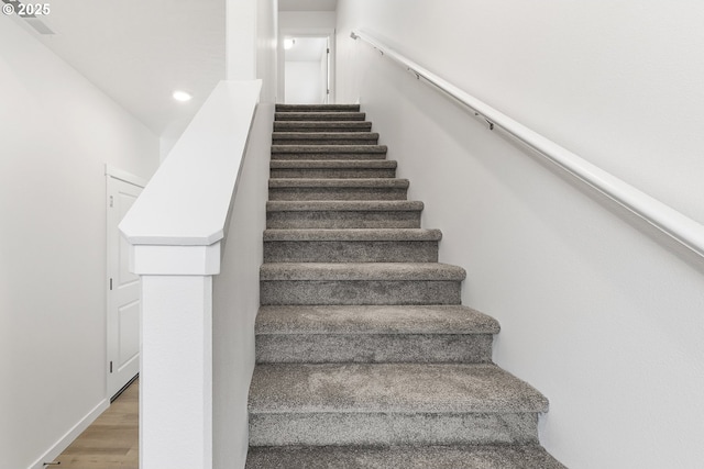 1129 NE Emerald Dr, Hermiston, OR 97838 - stairway with wood finished floors and recessed lighting