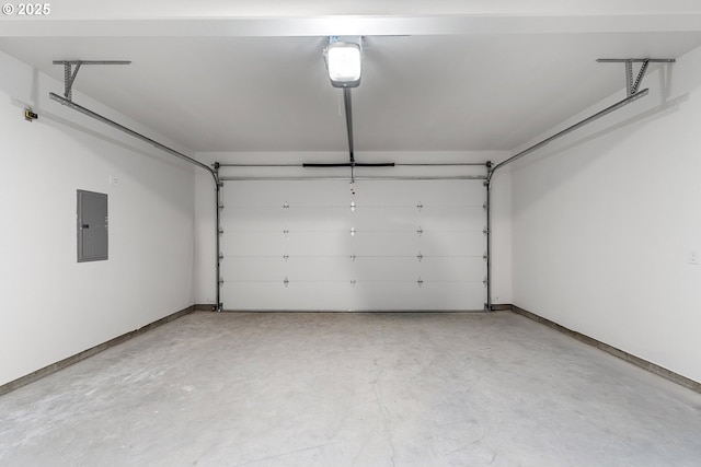 1129 NE Emerald Dr, Hermiston, OR 97838 - garage with electric panel, baseboards, and a garage door opener