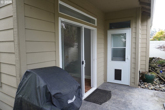 doorway to property featuring a patio