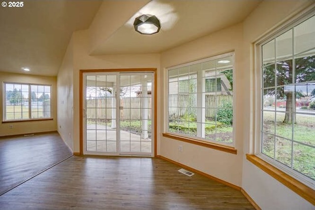 doorway featuring dark hardwood / wood-style flooring