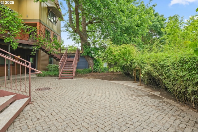 4475 N Trenton St Unit 101, Portland, OR 97203 - view of patio featuring stairway