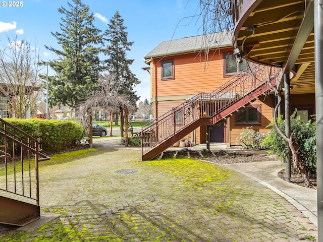 view of yard featuring stairs