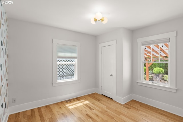 7505 SE 22nd Ave, Portland, OR 97202 - unfurnished bedroom featuring light wood-style floors and baseboards