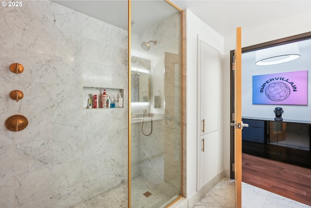 1221 SW 10th Ave Unit 410, Portland, OR 97205 - bathroom with a shower stall and marble finish floors