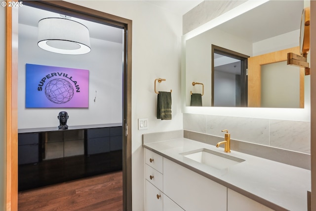1221 SW 10th Ave Unit 410, Portland, OR 97205 - bathroom featuring vanity and wood finished floors