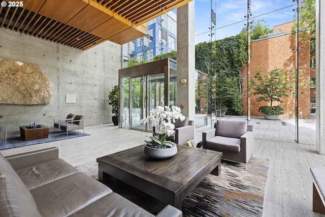 1221 SW 10th Ave Unit 410, Portland, OR 97205 - lobby with a high ceiling and a wall of windows