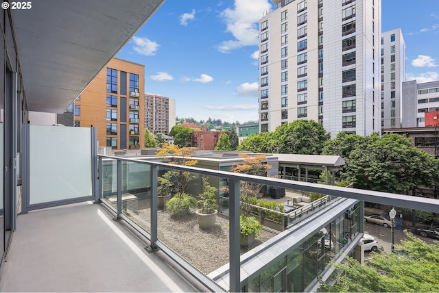 1221 SW 10th Ave Unit 410, Portland, OR 97205 - balcony featuring a city view